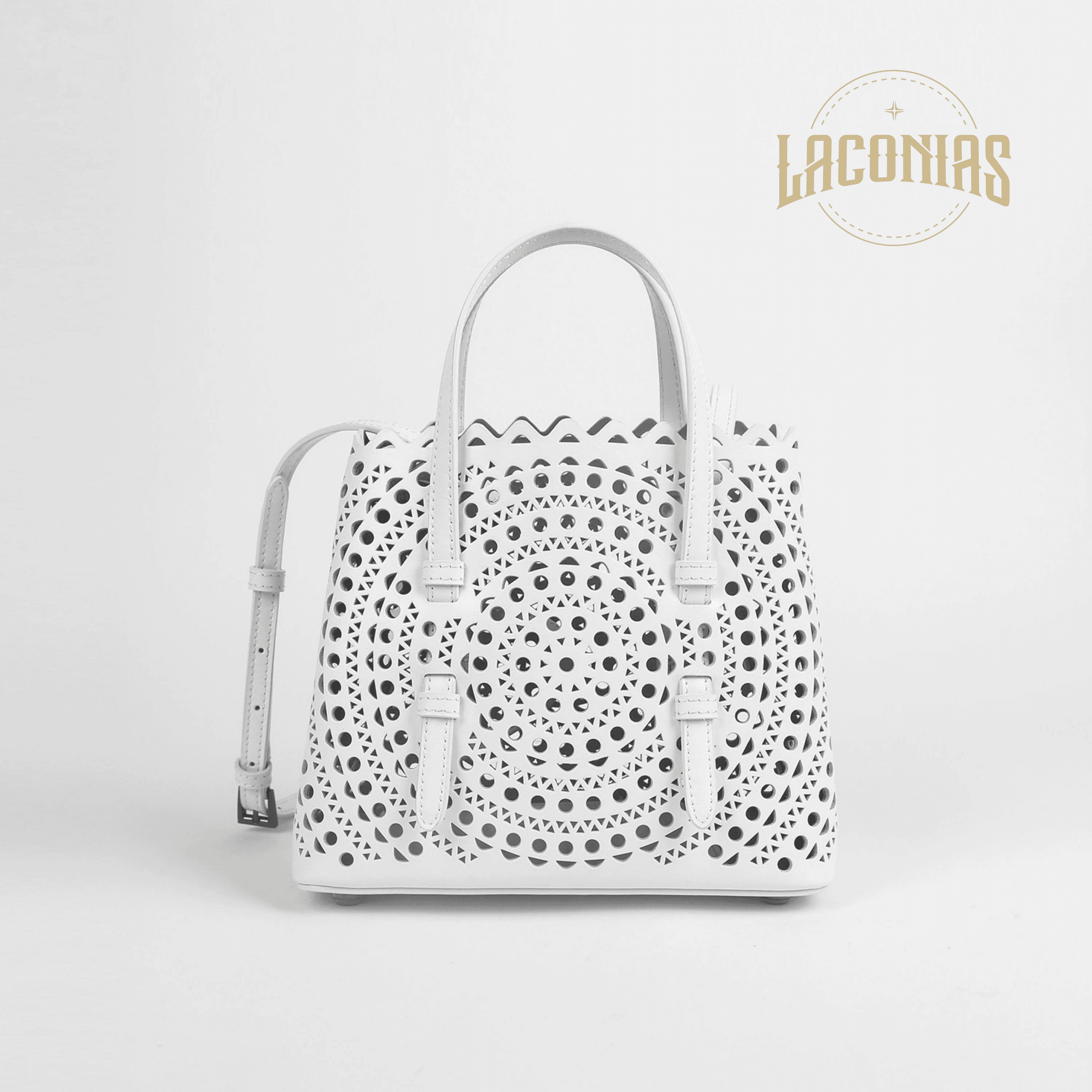 Cowhide hollow handbag