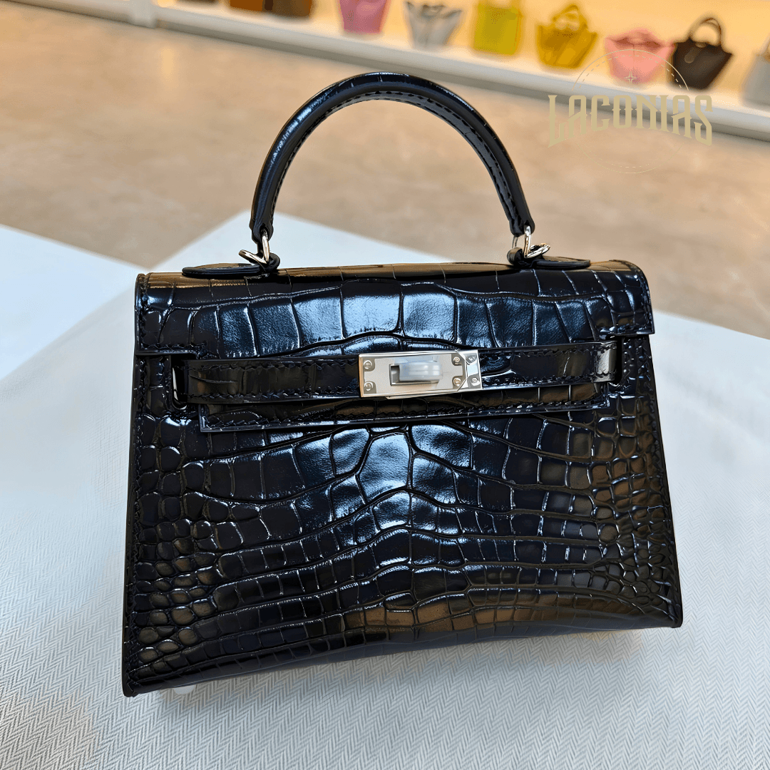 Hand-sewn mini cross-body bag with wax thread